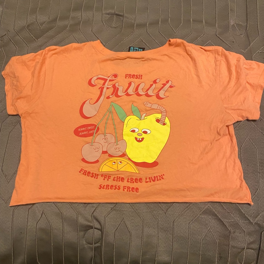 Short sleeve, coral crop top.